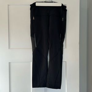 Lululemon cropped black leggings with zip pockets and sheer accents - size 8?